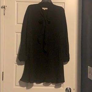 Long sleeve black dress with bow neck tie